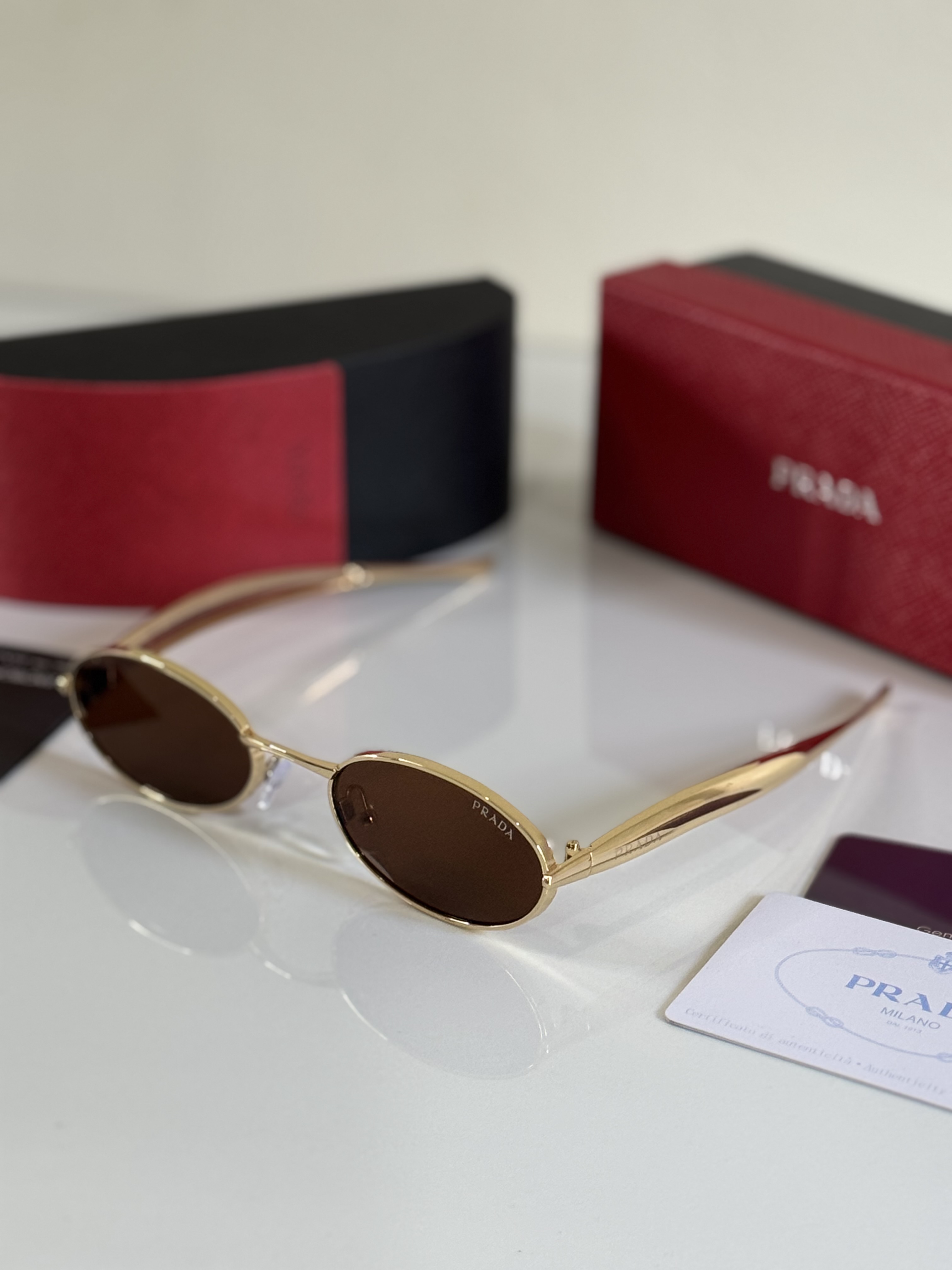 Prada PR 65ZS Signature Oval